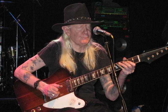 Johnny Winter on slide guitar