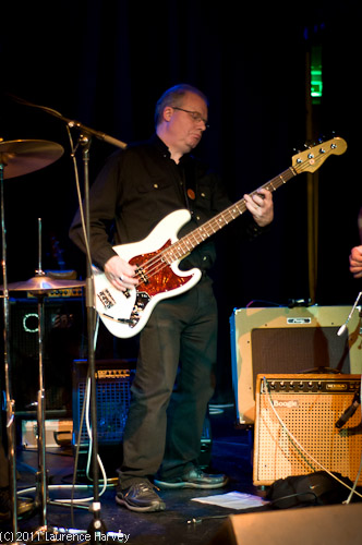Roger Batchelor on bass guitar