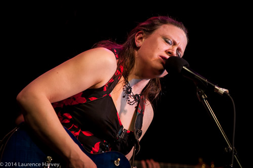 Clare Free on guitar and vocals