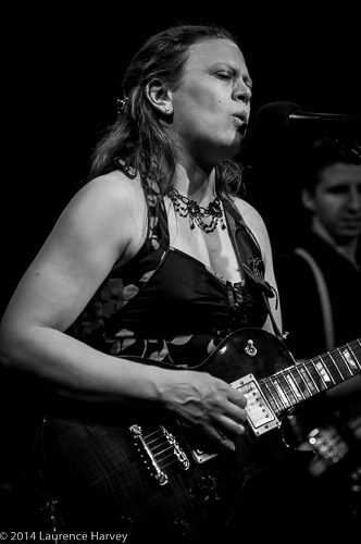 Clare Free on guitar and vocals