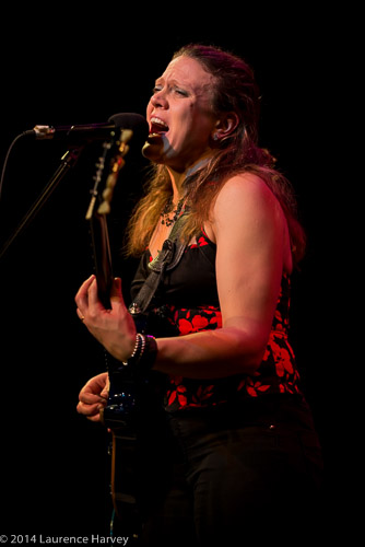 Clare Free on guitar and vocals