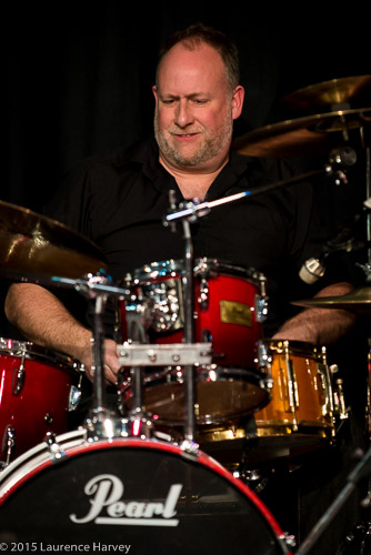 Brian Greene on drums
