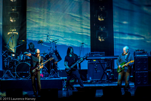 Joe Satriani & his band on stage at Hammersmith Apollo. Marco Minnemum on drums, Bryan Beller on bass, Mike Keneally on keyboards & guitar