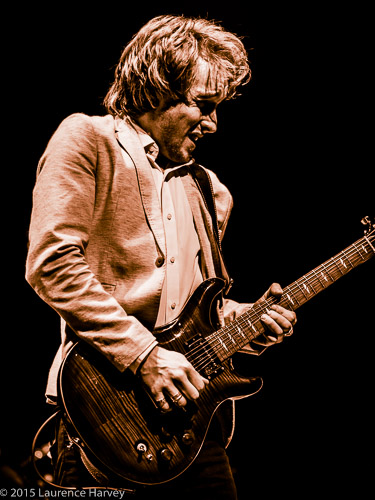 Alex Butler on guitar and backing vocals