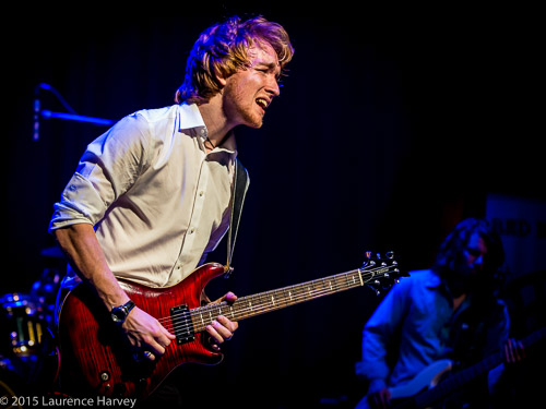 Alex Butler on guitar and backing vocals