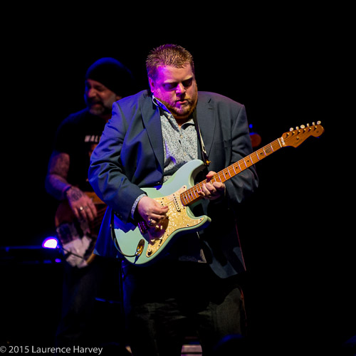 Danny Bryant soloing on stage with Walter Trout