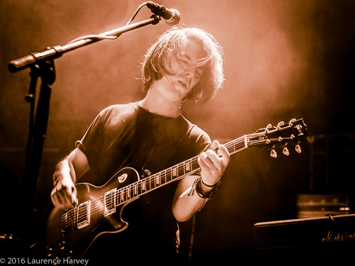 Ali Clinton on guitar & vocals
