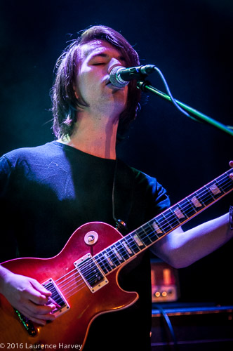 Ali Clinton on guitar & vocals