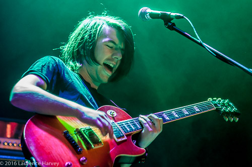 Ali Clinton on guitar & vocals