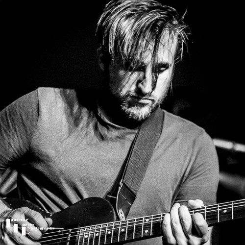 Alex Cockburn on lead guitar