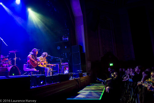 Curran on stage at Islington Assembly Hall