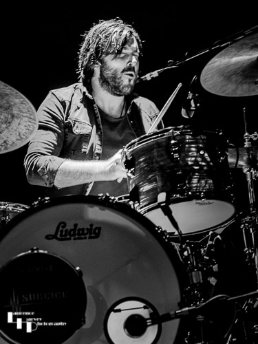 Wayne Proctor on drums
