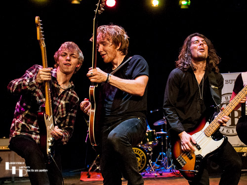 Alex Butler on lead guitar, Mike Topp on bass & Dan Spellman on rhythm guitar