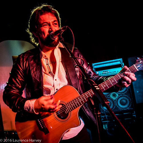 Jason Sweeney on lead vocals & acoustic guitar