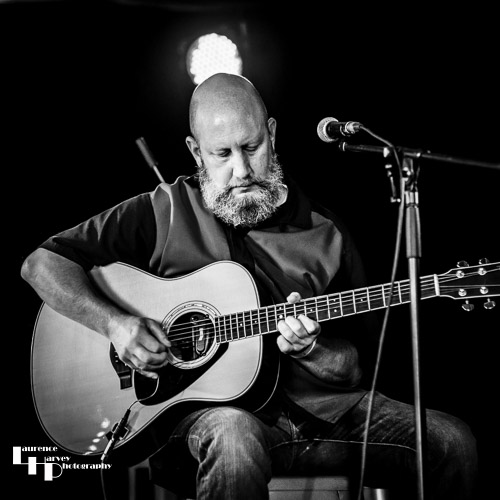 Azza's Bluzn Rootz guitarist