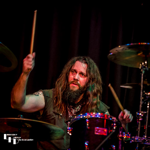 Karl Randall on drums