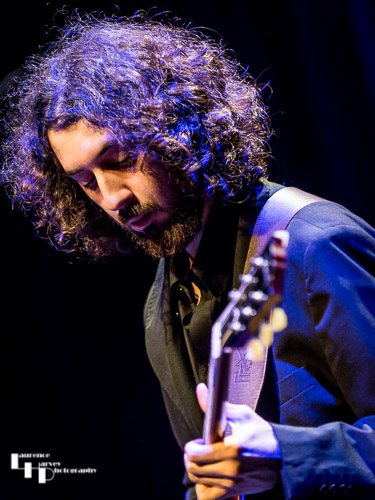 Kid Carlos on guitar