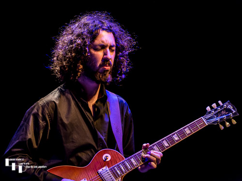 Kid Carlos on guitar