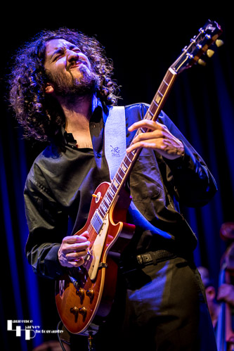 Kid Carlos on guitar