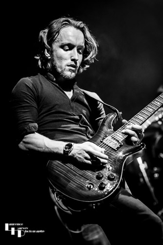 Alex Butler on lead guitar and backing vocals