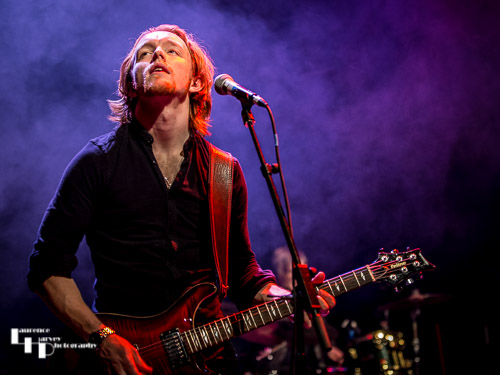 Alex Butler on lead guitar and backing vocals