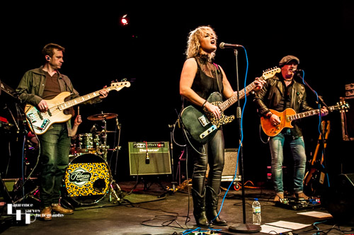 Rebecca Downes & her band on stage at The Limelight Theatre