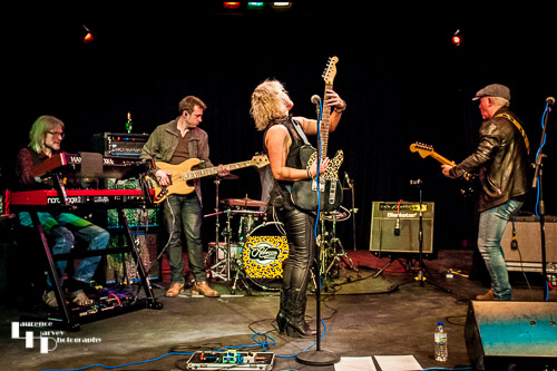 Rebecca Downes & her band on stage at The Limelight Theatre