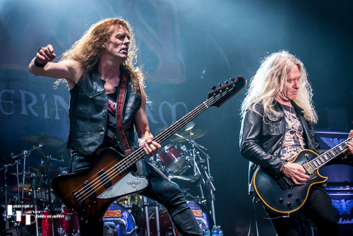 Saxon: Nibbs Carter on bass & Doug Scarratt on guitar