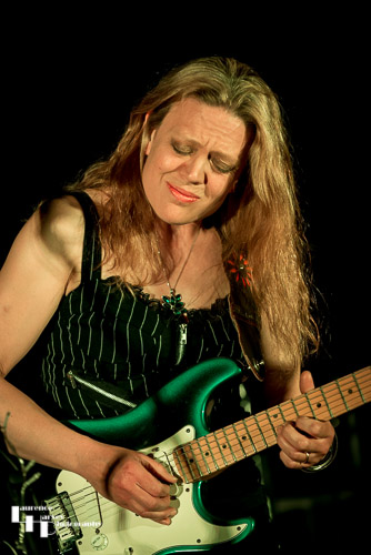 Clare Free on guitar