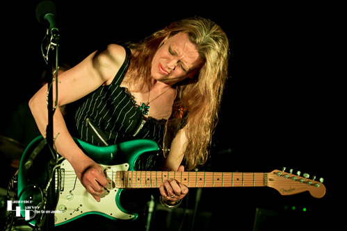 Clare Free on guitar