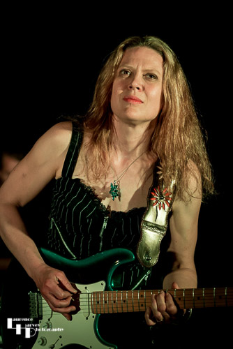 Clare Free on guitar