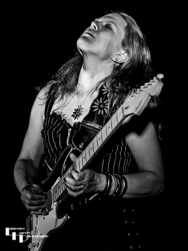Clare Free on guitar
