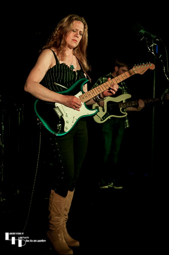 Clare Free on guitar