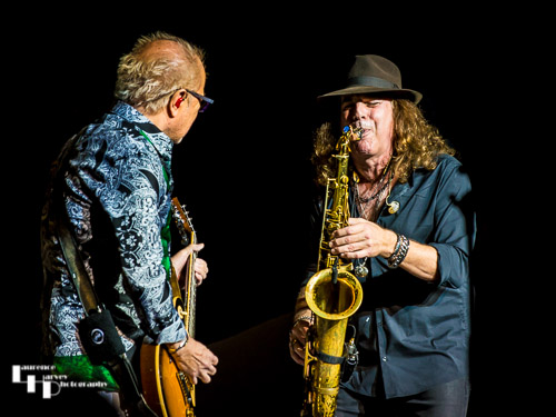 Mick Jones on lead guitar & Tom Gimbel on sax