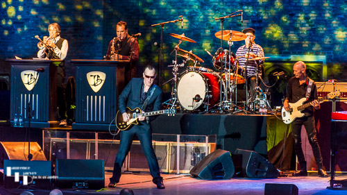 Joe Bonamassa & his band on stage at the Hampton Court Palace Festival