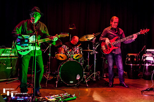 Derik Timms on guitar, Graham Walker on drums & Eddie Masters on bass