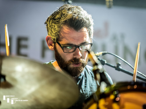 Sam Edwards on drums