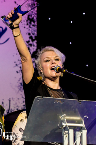 Rebecca Downes receiving her UK Blues Award at The Harlington