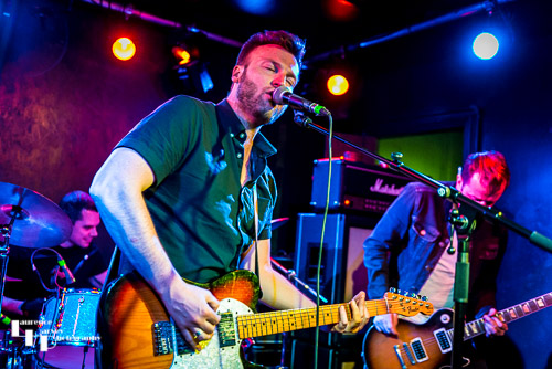 John Drake on lead vocals & guitar