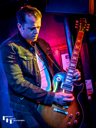 Adam Mackie on lead guitar
