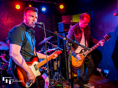 John Drake on lead vocals & guitar, Adam Mackie on lead guitar