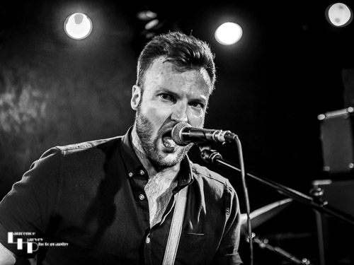 John Drake on lead vocals & guitar