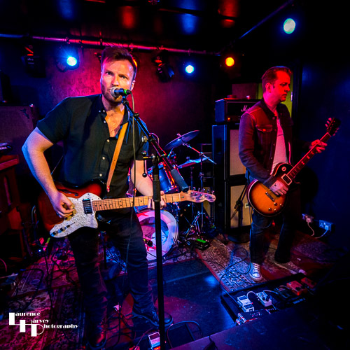 John Drake on lead vocals & guitar, Adam Mackie on lead guitar
