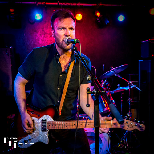 John Drake on lead vocals & guitar