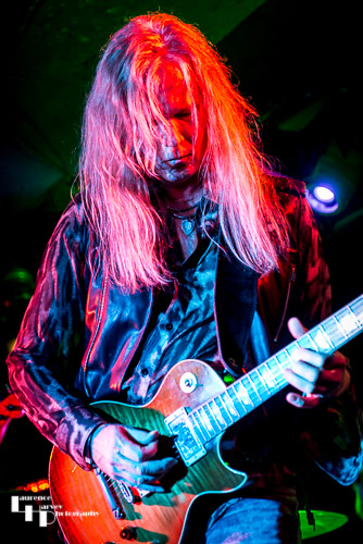 Adrian Vandenberg on guitar
