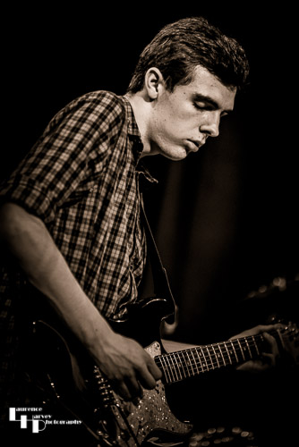 Cameron Evans on guitar