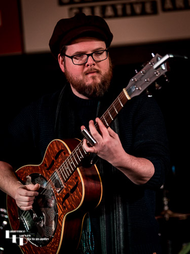 Mark ‘Boweevil’ Howes on guitar