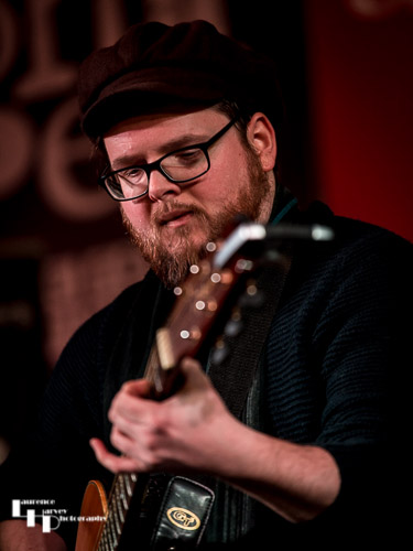 Mark ‘Boweevil’ Howes on guitar