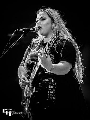 Tori Mai on rhythm guitar & vocals