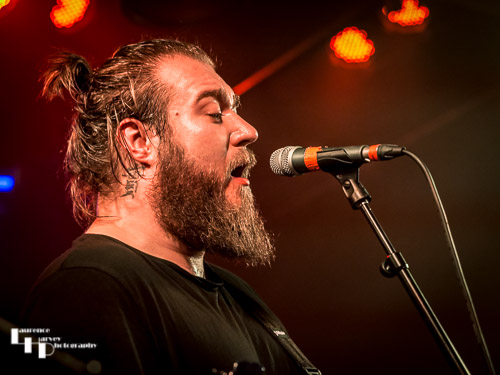 Luke Allatt on rhythm guitar & vocals